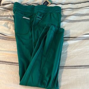Brand new green Cherokee jogger pants with tags size xs women’s